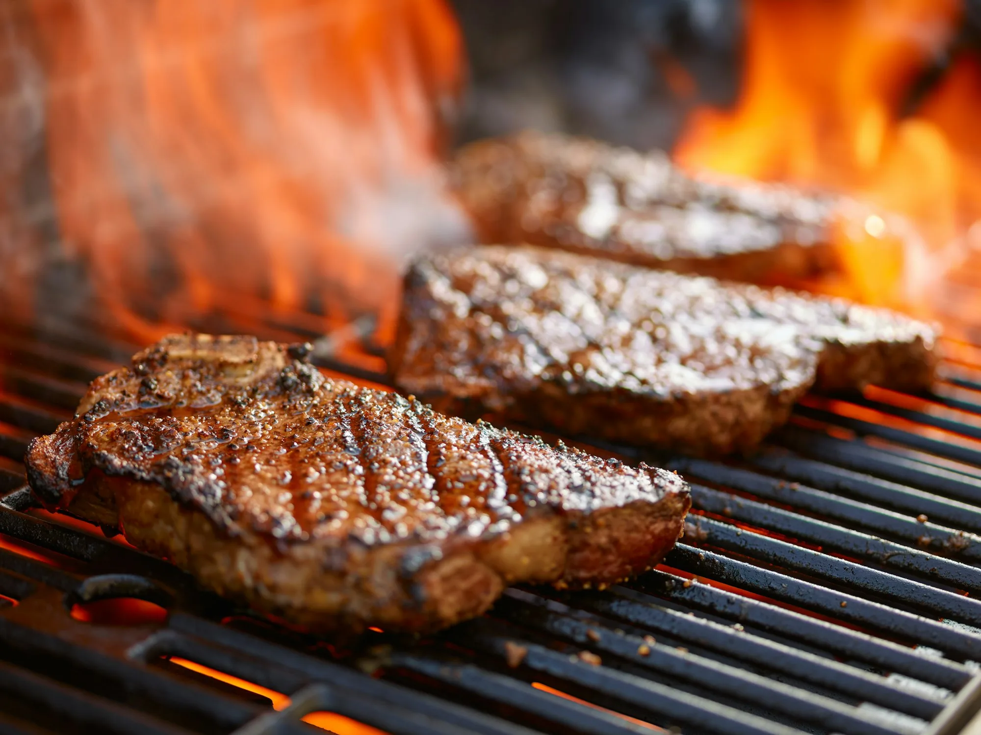 Meat on the flaming grill